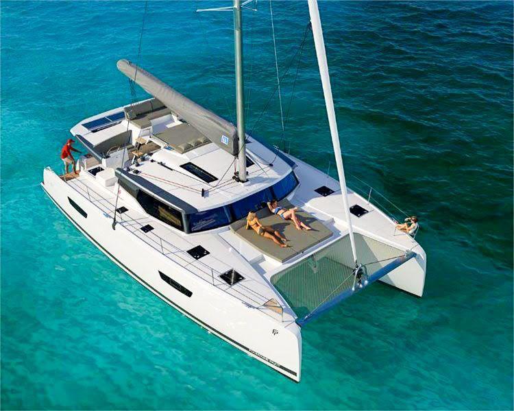 The 5 Best Beaches to Visit by Yacht in Puerto Vallarta Aerial view of a catamaran at sea